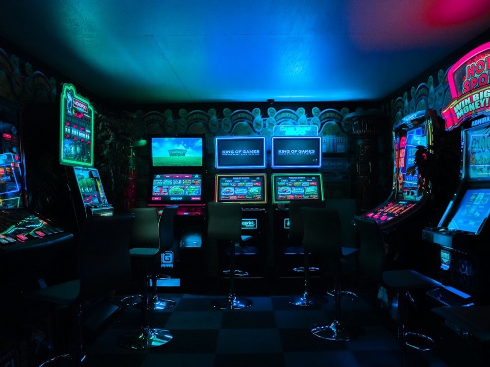 Arcade machines in a dark room
