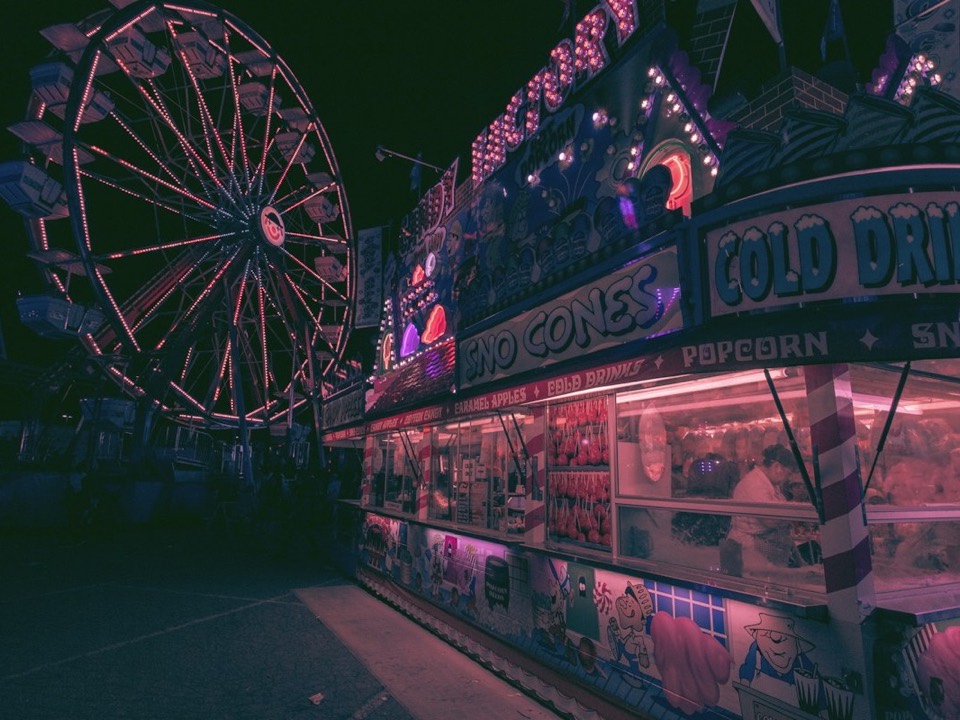 A fairground at night